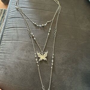 Triple chain butterfly necklace
